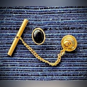 Vintage midcentury heirloom tie tack, gold tone with black cabochon.